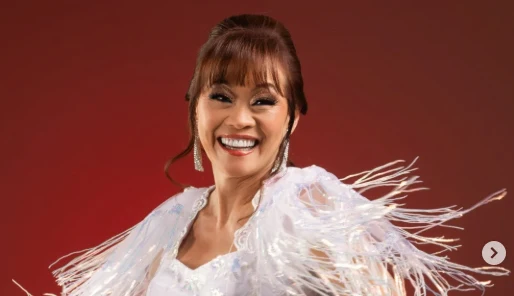 Foto de Mimy Succar, cantora peruana de salsa vencedora de dois prêmios Grammy
